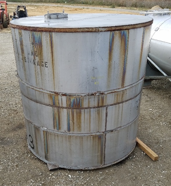 used 2800 Gallon Stainless Steel vertical Storage tank. 7'10